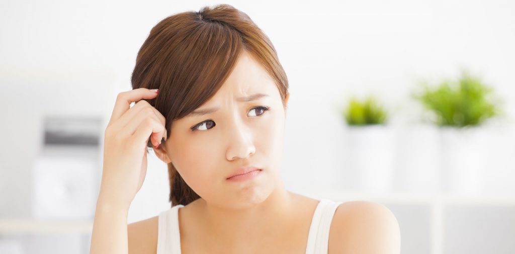 Closeup of woman with questioning look on her face