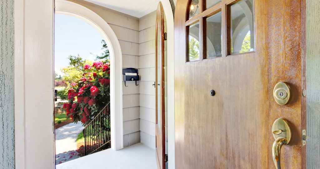 Entry way to home with concrete porch area