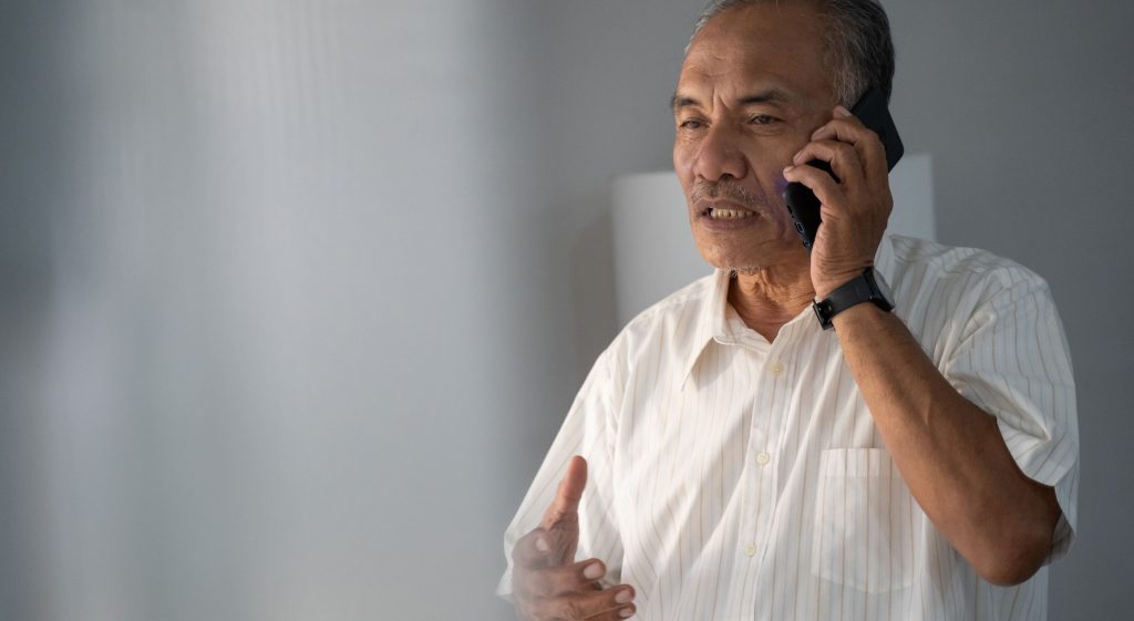 Man making a call on a cell phone