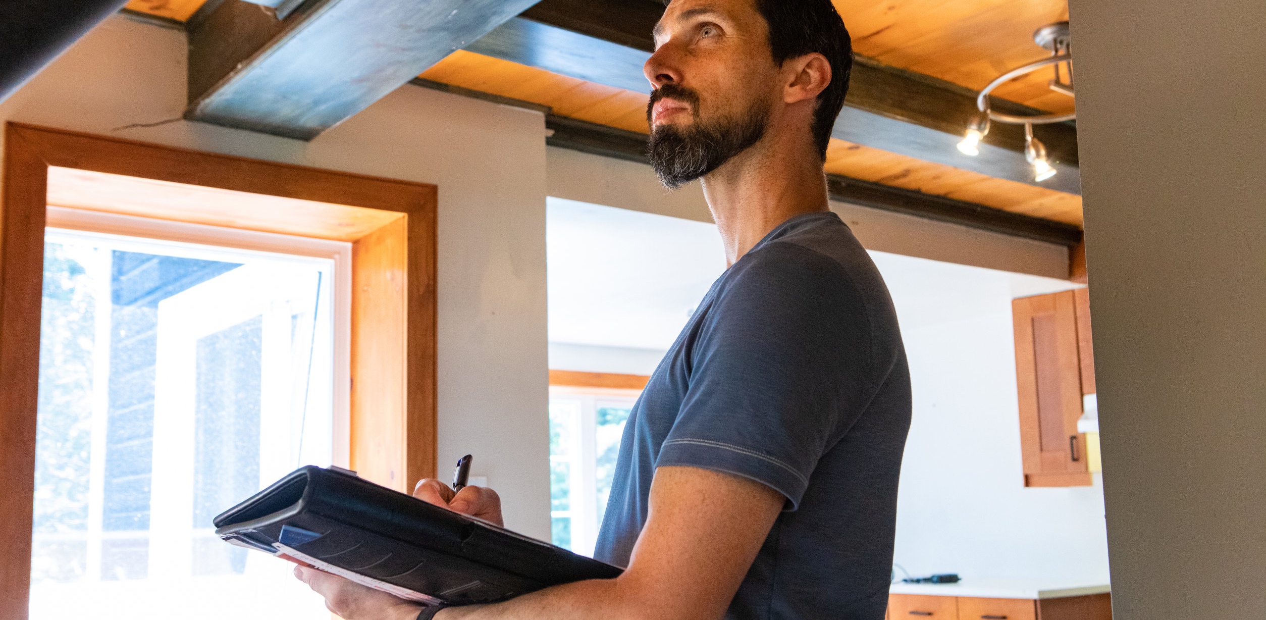 Man inspecting the interior of a home