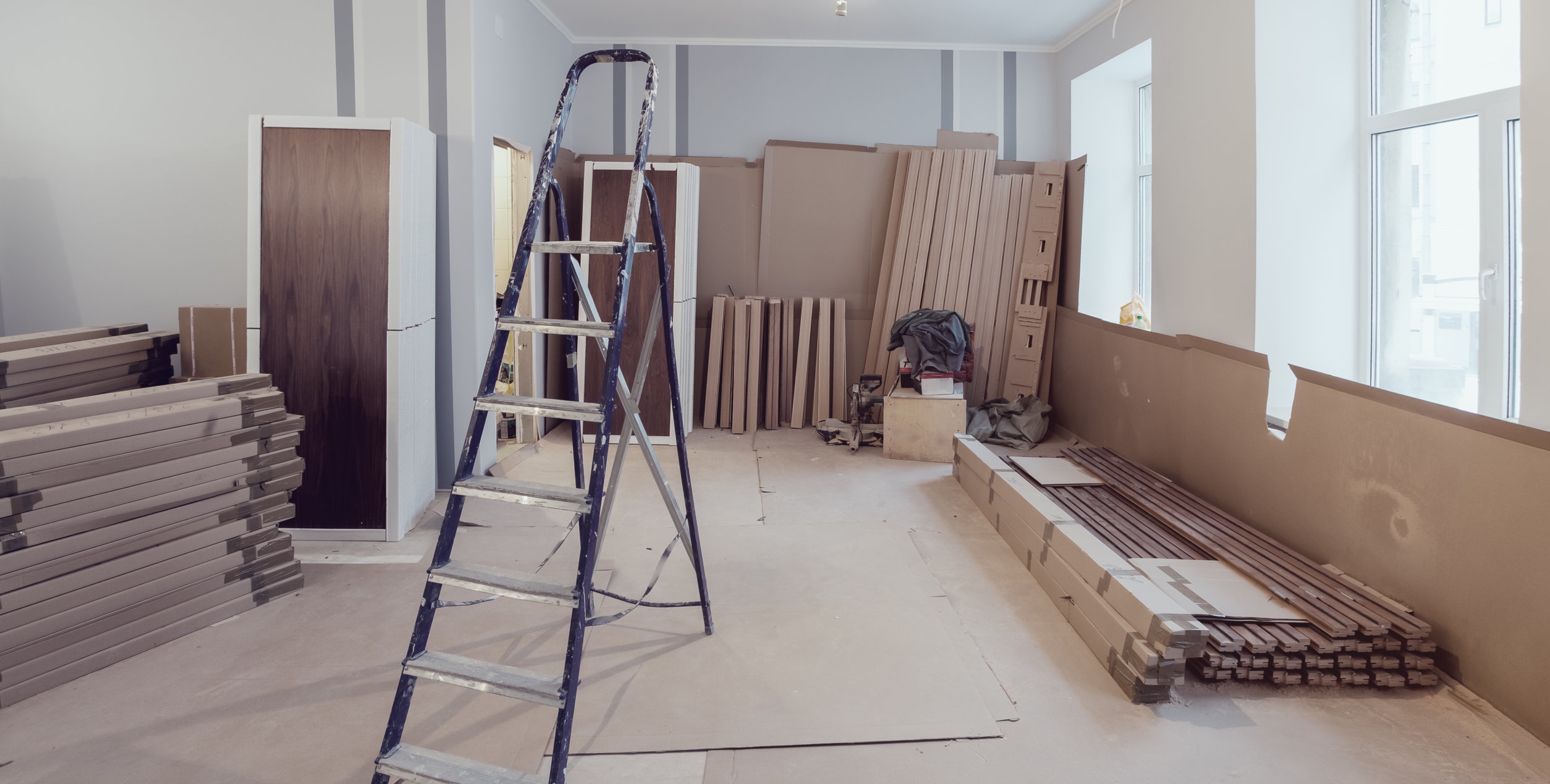 Residential room full of renovation materials