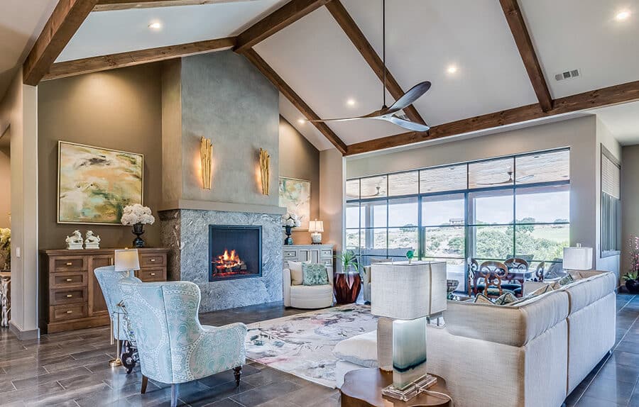 Living room of a home with open floor plan and vaulted ceiling
