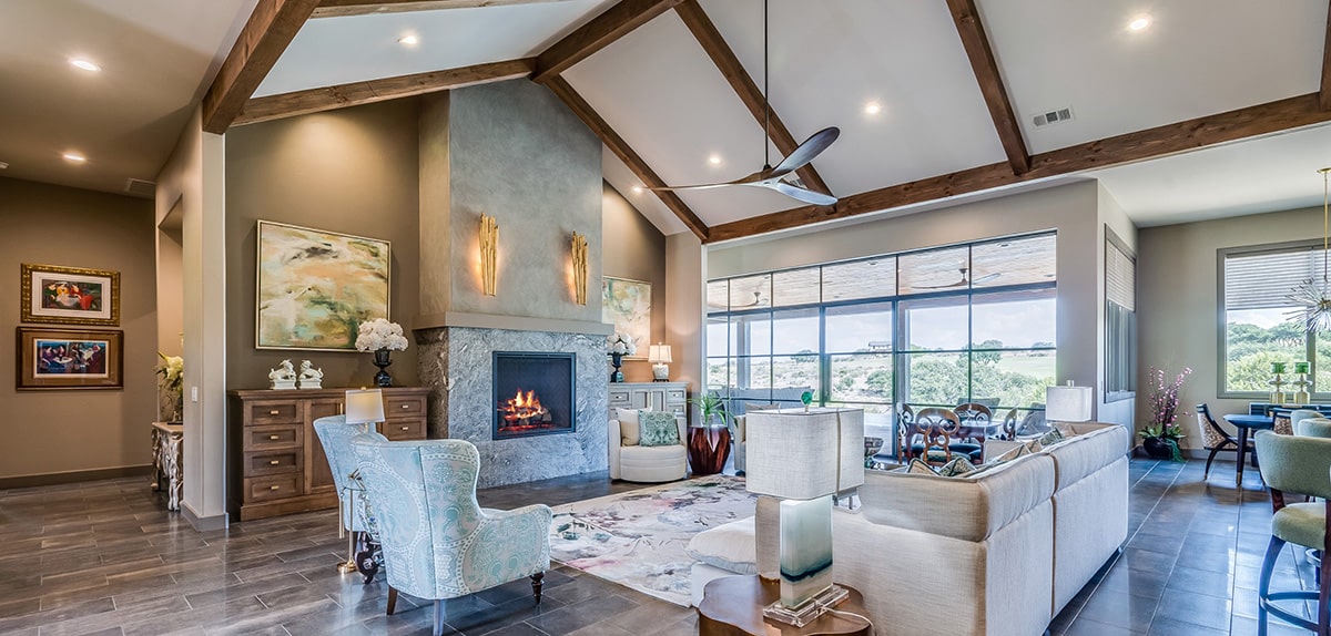Living room of a home with open floor plan and vaulted ceiling