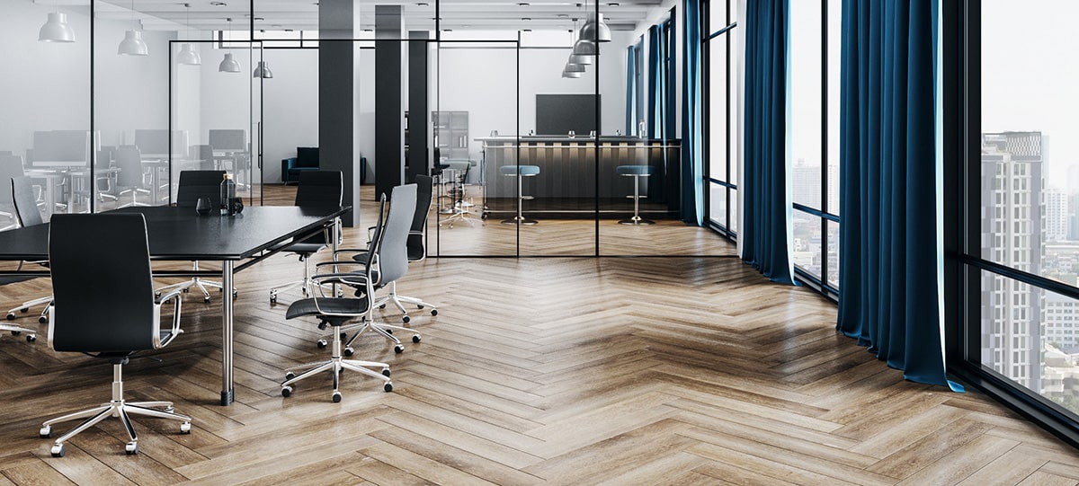 Office with table chairs and partitions
